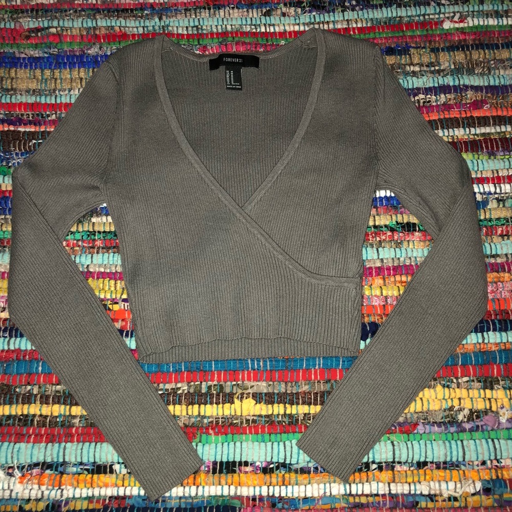 grey long-sleeve top